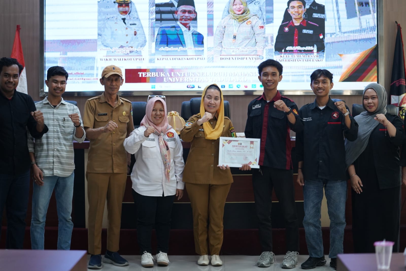 Wawali Bersama Kadinkes Palu jadi Narasumber di acara Simposium Edukasi AIDS di Untad